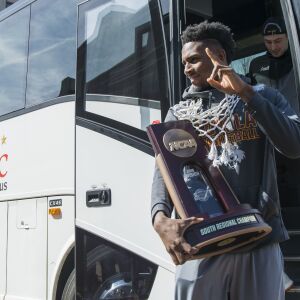 Donte Ingram steps off with the NAACP South Regional Championship trophy. | Tyler LaRiviere/Sun-Times