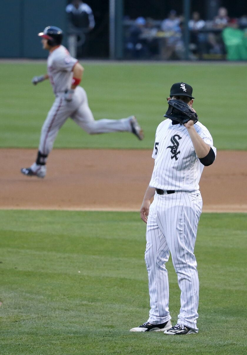 <em>James Shields waits for a new ball after giving up a two-run home run to Washington Nationals’ Ryan Zimmerman during the first inning. (AP Photo/Charles Rex Arbogast)</em>