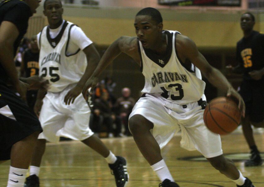Mount Carmel’s Tracy Abrams drives against Seton in 2009.