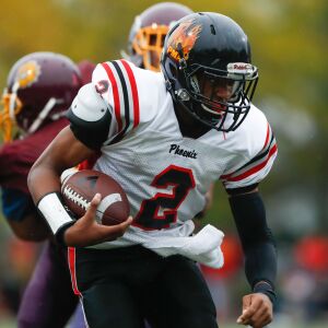 Phoenix’s Jamon Gooden (2) runs the ball against Marine.