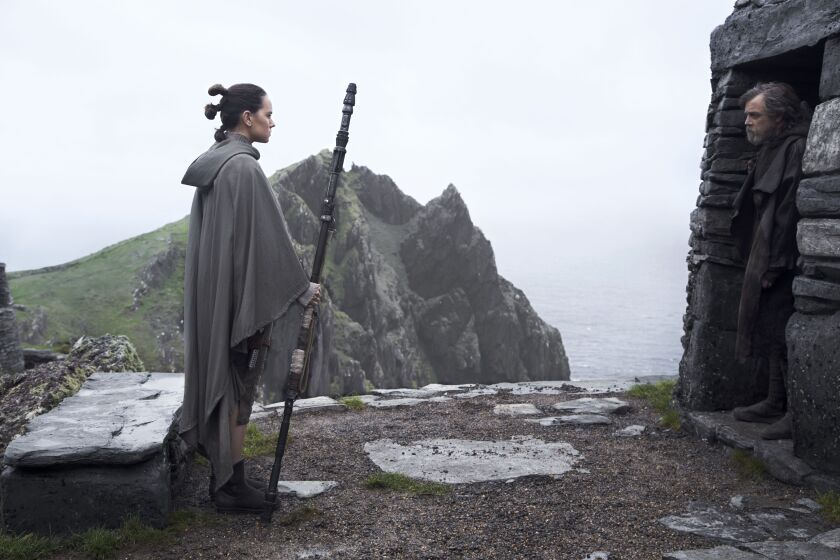 Rey (Daisy Ridley) confronts Luke Skywalker (Mark Hamill) in “Star Wars: The Last Jedi.” | LUCASFILM