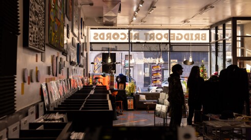 Vinyls and memorabilia line the walls at Bridgeport Records on the South Side, Sunday, Dec. 21, 2025.