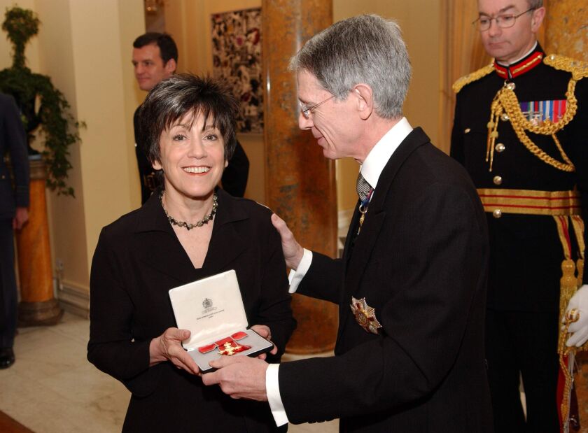Chicago Shakespeare Theater Artistic Director Barbara Gaines receives the insignia for her Honorary OBE (Order of the Most Excellent Order of the British Empire) from Sir David Manning, the British Ambassador to the United States, at the Residence of the Ambassador in Washington D.C. on Friday, Feb. 10, 2006. The award, decreed by Queen Elizabeth II, recognizes Gaines’ “unique contribution strengthening British-American cultural relations.”