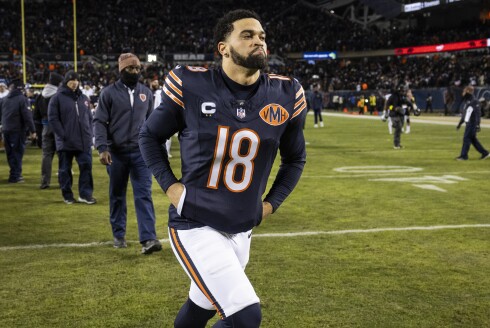 Bears quarterback Caleb Williams runs off the field after his team's 19-16 loss to the Detroit Lions at Soldier Field on Sunday, Jan. 4, 2026.