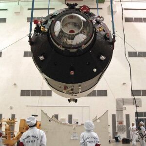 Researchers installing China’s first space station module Tiangong-1. | Color China Photo via AP file photo