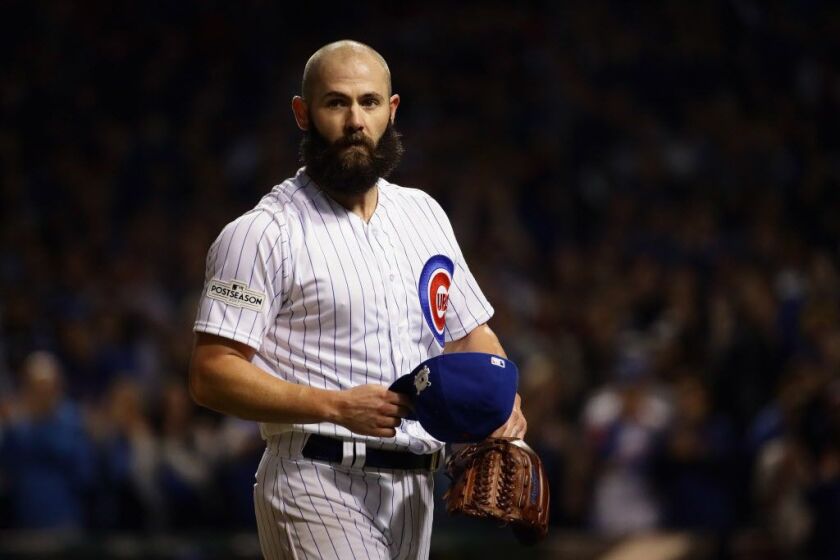 CHICAGO, IL – OCTOBER 18: Jake Arrieta #49 of the Chicago Cubs walks off the field after being relieved in the seventh inning against the Los Angeles Dodgers during game four of the National League Championship Series at Wrigley Field on October 18, 2017