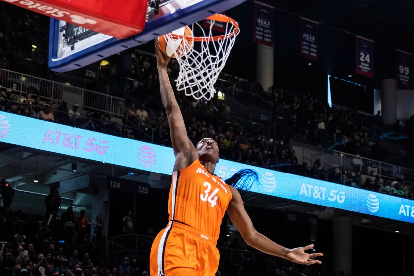 Minnesota Lynx’s Sylvia Fowles dunks the ball during the 2nd period of the WNBA All-Star basketball game Sunday afternoon at Wintrust Arena.