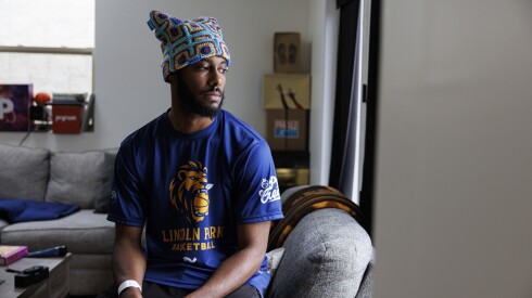 Gentry Hunt sits in his home in Garfield Park, Wednesday, Dec. 31, 2025. Hunt was of the victims shot outside St. Sabina Church when an altercation broke out during a basketball tournament. | Anthony Vazquez/Sun-Times