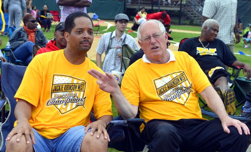 <small><strong>Ald. Anthony Beale (9th) and then-Gov. Pat Quinn were among many who attended a party at Jackie Robinson Park last summer, where a big screen was set up to watch Jackie Robinson West play in the Little League World Series. | Michael Schmid