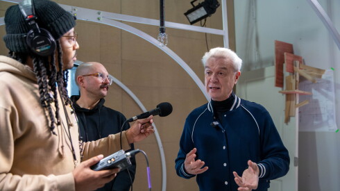 Andrew Scoville (center) and David Byrne (left) with reporter Mike Davis at the installation for “Theater of the Mind.”