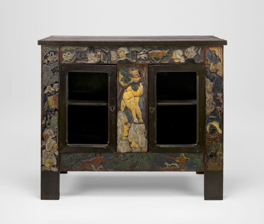 “Earthly Paradise” (1888) a chestnut and pine cabinet, carved and polychromed, part of the Art Institute of Chicago exhibit, “Gauguin: Artist as Alchemist.” | Courtesy Art Institute of Chicago