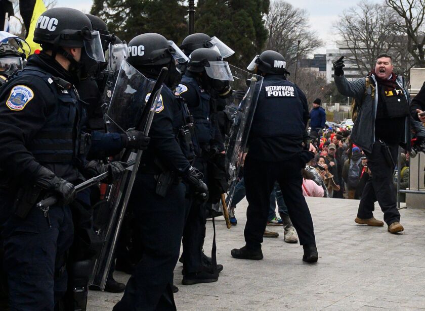 Trump supporters face off with police and security forces in front of the US Capitol on Wednesday.
