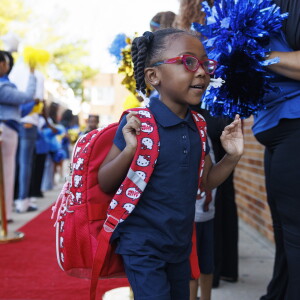 Students walk into school Monday on the first day of class at George Leland Elementary School at 512 S. Lavergne Ave. in Austin.
