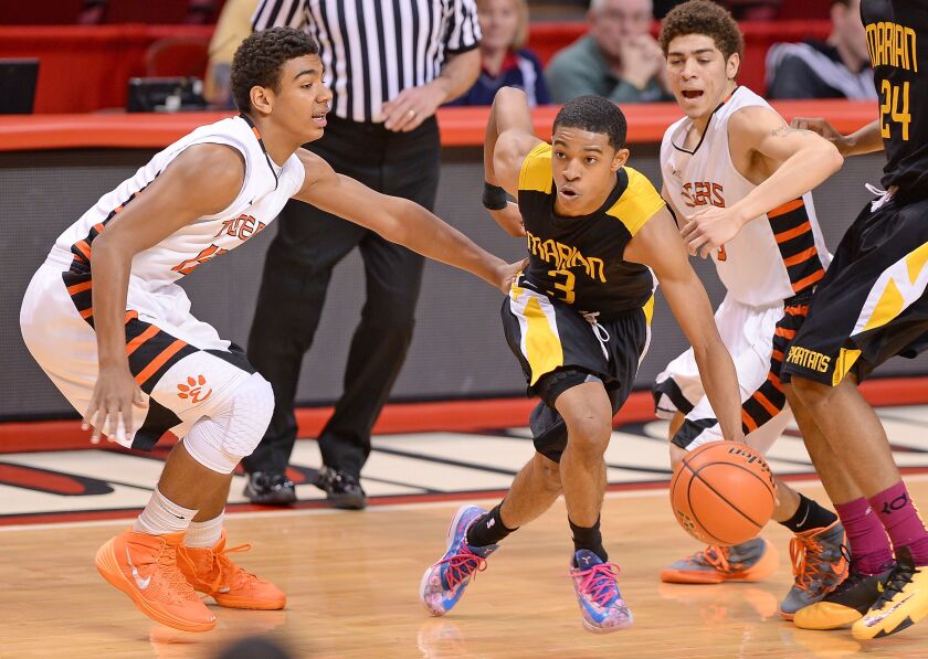 Marian Catholic’s Tyler Ulis against Edwardsville at Illinois State’s Redbird Arena.