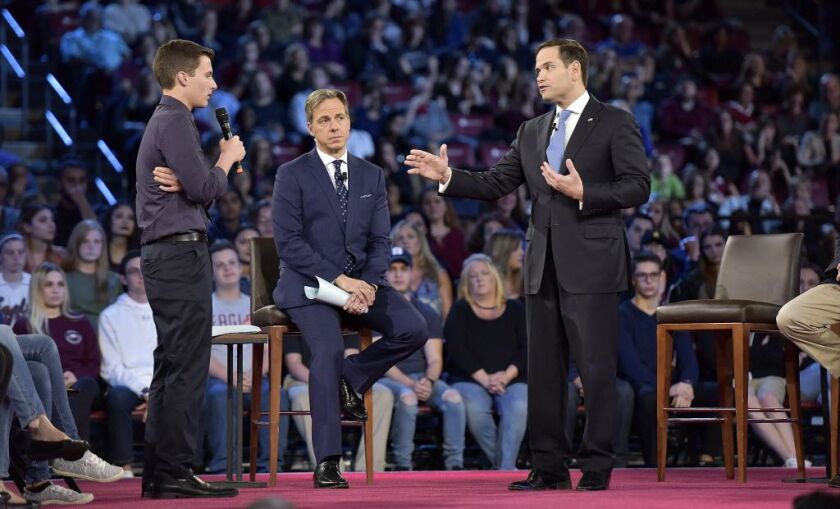 Marjory Stoneman Douglas High School student Cameron Kasky asks a question to Sen. Marco Rubio during a CNN town hall meeting at the BB;T Center in Sunrise, Florida., on Wednesday, Feb. 21, 2018. | Michael Laughlin/South Florida Sun-Sentinel via AP