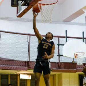Solorio’s Amarion Fields (23) shoots the ball against Lindblom.