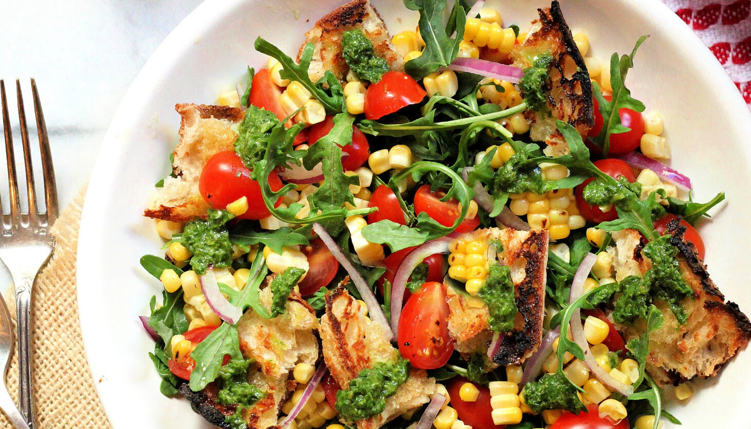 Vibrant salad inspired by Italian panzanella takes advantage of sweet corn and juicy tomatoes at their peak