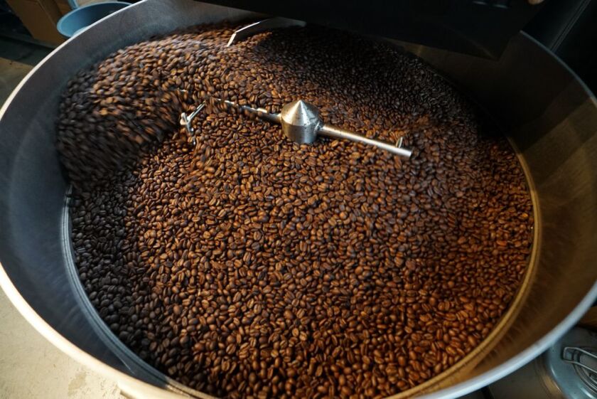Coffee beans being roasted at Hexe Coffee.