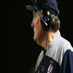 Lisle’s coach Paul Parpet leads the Lions to a victory over Streator. | Allen Cunningham / for Chicago Sun-Times