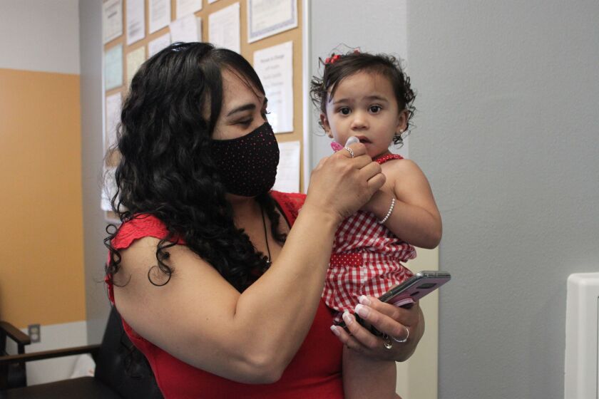 Margarita Mora, dropping her daughter at Cuidando Los Ninos in Albuquerque, N.M., knows what she’ll do with the child tax credit checks. “I’ll be able to pay my utilities and basic supplies, plus gas to go look for work,” said Mora, an unemployed caregiver. “And I need to work on my debt.”