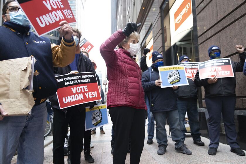 U.S. Representative Jan Schakowsky stands alongside Chicago union workers outside of the Amazon corporate offices Friday to show support for union efforts in Bessemer, Alabama.