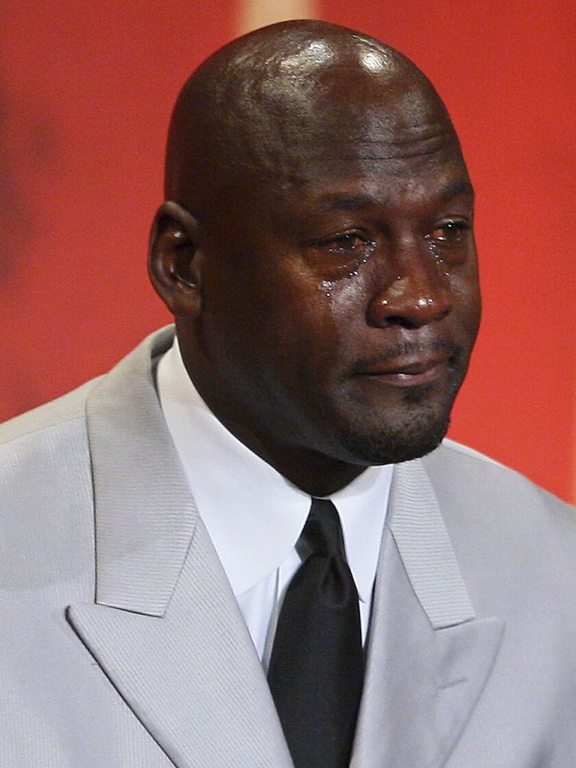 In this Sept. 11, 2009, file photo, Michael Jordan cries as he takes the podium during his enshrinement ceremony into the Naismith Basketball Hall of Fame in Springfield, Mass.