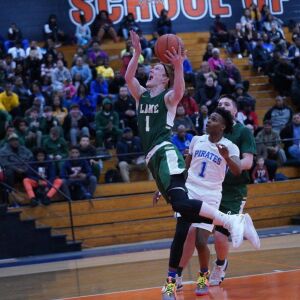 Lane’s Michael Molloy (1) gets down court for a basket against Proviso East, Wednesday 02-27-19. Worsom Robinson/For Sun-Times