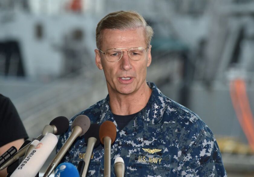 Vice Adm. Joseph Aucoin, commander of the U.S. 7th Fleet, delivers a speech at a press conference in front of the guided missile destroyer USS Fitzgerald at US Navy Yokosuka Base, southwest of Tokyo on June 18, 2017. | Kazuhiro Nogi | AFP/Getty Images