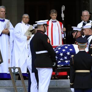The casket of Sen. John McCain, R-Ariz., is carried on arrival for a memorial service at the Washington National Cathedral in Washington, Saturday, Sept. 1, 2018. (AP Photo/Manuel Balce Ceneta) ORG XMIT: DCMC110