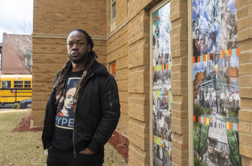 Mike Stidham created some of the panels that appear on the Lazarus Apartments.