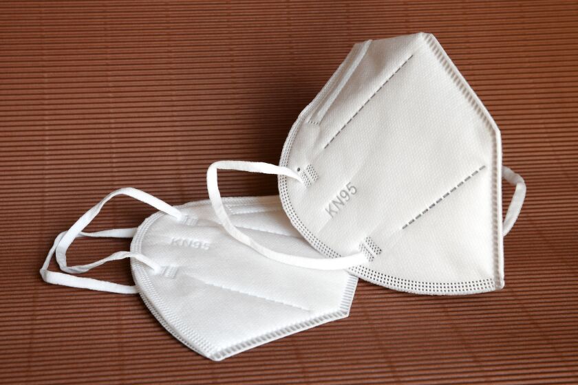 Health experts now warn against common cloth masks and recommend masks that produce an electrostatic charge, like N95 and KN95 (pictured) styles.