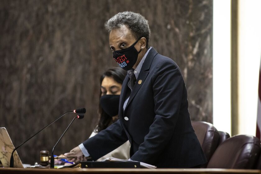 Mayor Lori Lightfoot on Wednesday presided at her first in-person City Council meeting in more than a year.
