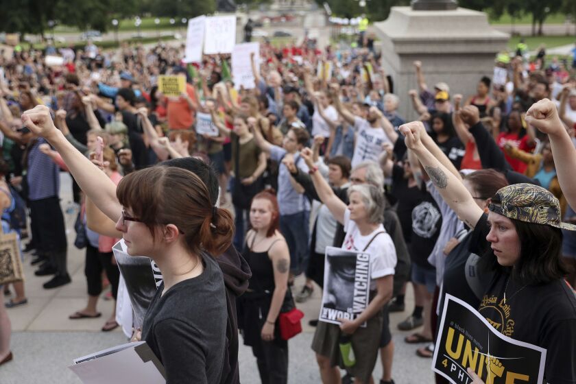 Supporters of Philando Castile gather Friday outside the state Capitol in St. Paul, Minn. The vigil was held after St. Anthony police Officer Jeronimo Yanez was cleared Friday in the fatal shooting of Castile last year. |<br>Anthony Souffle/Star Tribune v