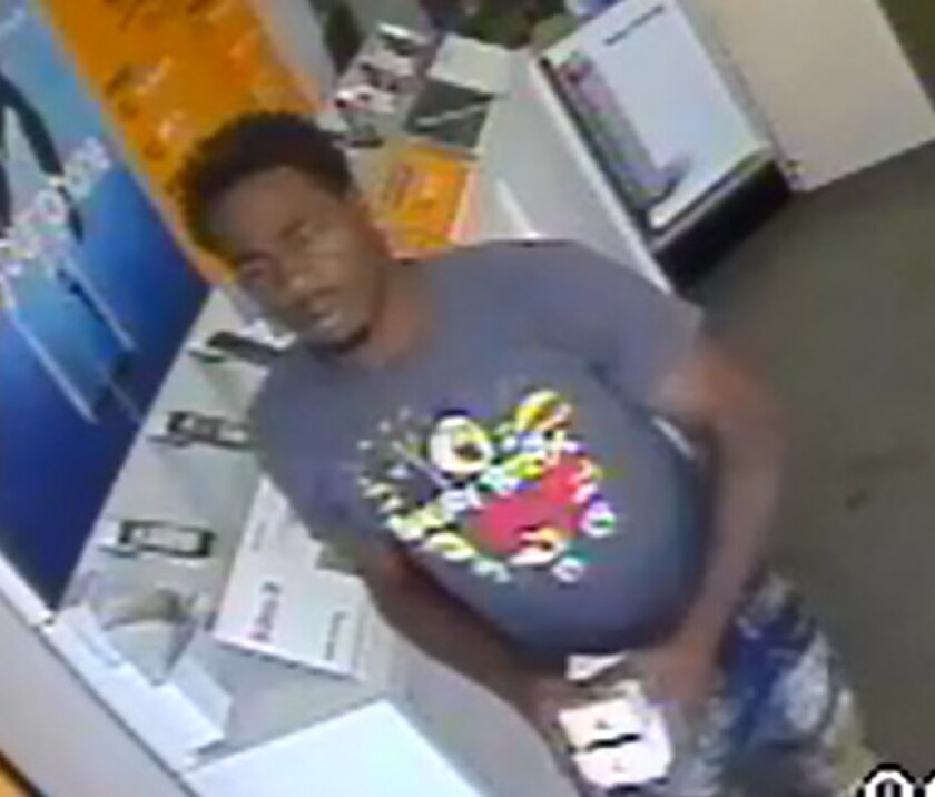 Surveillance photo of one of the suspects who held up a Southwest Side cellphone store. | Chicago Police