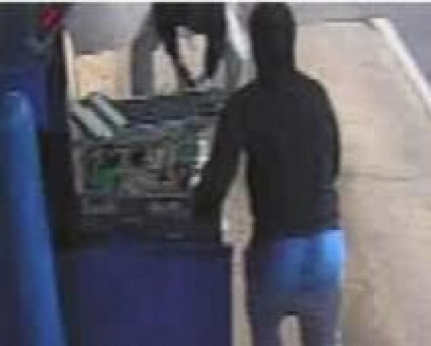 Surveillance image of a suspect in an ATM robbery June 28 outside a Chase Bank at 1783 River Oaks Drive in Calumet Heights. | FBI