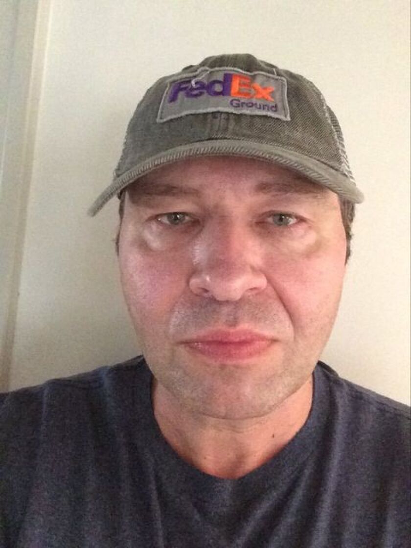 Dennis Fritz got a job as a package handler after he lost his office job at a clothing store that was forced to close. The switch came with a 40% pay cut.
