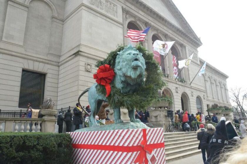 The wreathing of the lions at the Art Institute of Chicago. | Brian Jackson/ Sun-Times