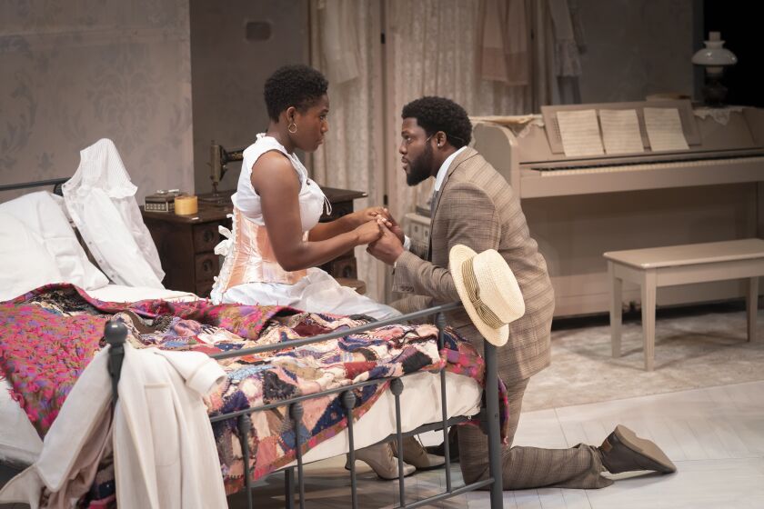 Mildred Marie Langford and Yao Dogbe are among the cast of “Intimate Apparel” at Northlight Theatre.