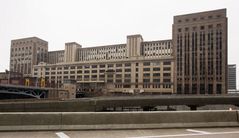The former main post office, which was built with a hole in the middle to accommodate the as-yet unbuilt Eisenhower Expressway, has been vacant since 1995. | File photo