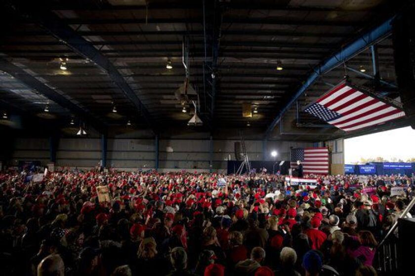 President Donald Trump speaks at a rally at Southern Illinois Airport in Murphysboro, Ill., Saturday, Oct. 27, 2018. | AP Photo/Andrew Harnik