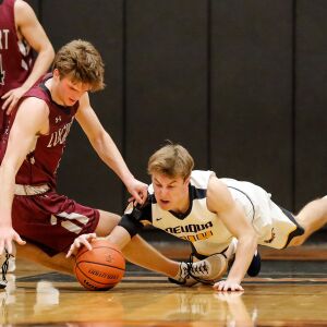Neuqua Valley’s Patrick Hoffmann (44) dives for possession against Lockport.