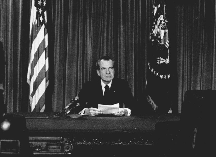 President Richard Nixon is shown on Aug. 8, 1974, speaking from the Oval Office to announce that he would resign from office effective at noon the next day.