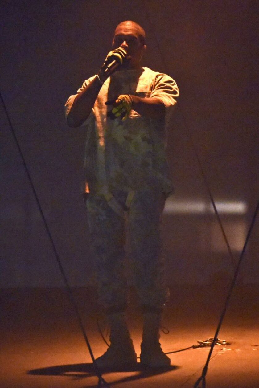 At times, the lighting made Kanye West almost disappear in the mist during his concert at the United Center on Friday, Oct 7, 2016, in Chicago. (Photo by Rob Grabowski/Invision/AP)