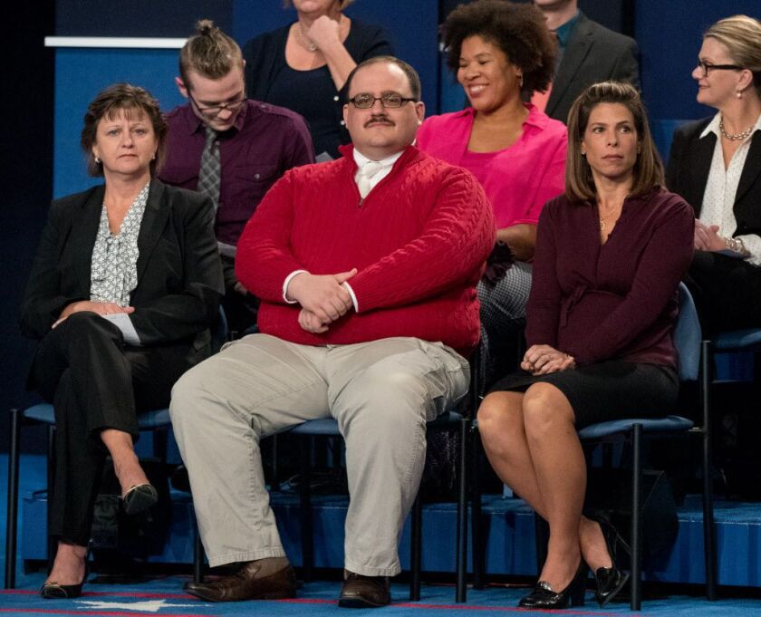 Kenneth Bone sits in the audience before the start of the second presidential debate at Washington University, Sunday, Oct. 9, 2016, in St. Louis. (AP Photo/Andrew Harnik)