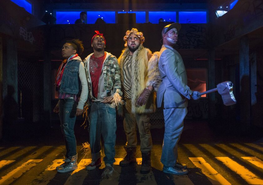 Sydney Charles (from left) is Dorothy, Gilbert Domally is the Scarecrow, Chuckie Benson is the Lion and Steven Perkins is the Tin Man in “The Wiz,” presented by Kokandy Productions at Theater Wit. (Photo: Michael Brosilow)
