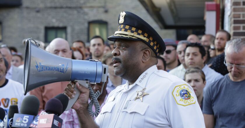 Chicago Police Superintendent Eddie Johnson speaks with city residents last summer. | AP File Photo/Teresa Crawford