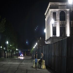 Protesters mingle in front of the Kenosha County Courthouse during peaceful protests on the fourth day of civil unrest after police shot Jacob Blake, Wednesday night, Aug. 26, 2020.