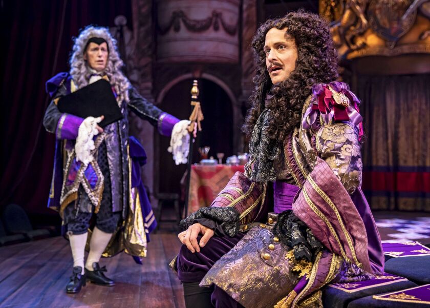 King Charles II (Timothy Edward Kane, foreground) rebuffs his advisor Lord Arlington (Larry Yando) in Chicago Shakespeare’s production of “Nell Gwynn,” directed by Christopher Luscombe. | Liz Lauren Photo