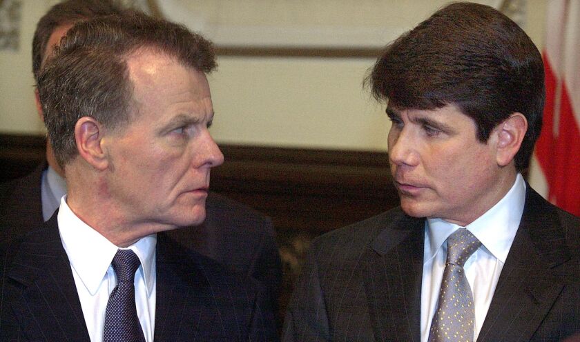 Illinois Speaker of the House Michael Madigan, D-Chicago, left, and Illinois Gov. Rod Blagojevich, right, appear together during a news conference in the Governor’s office at the Illinois State Capitol in Springfield, Ill., Friday, May 28, 2004.