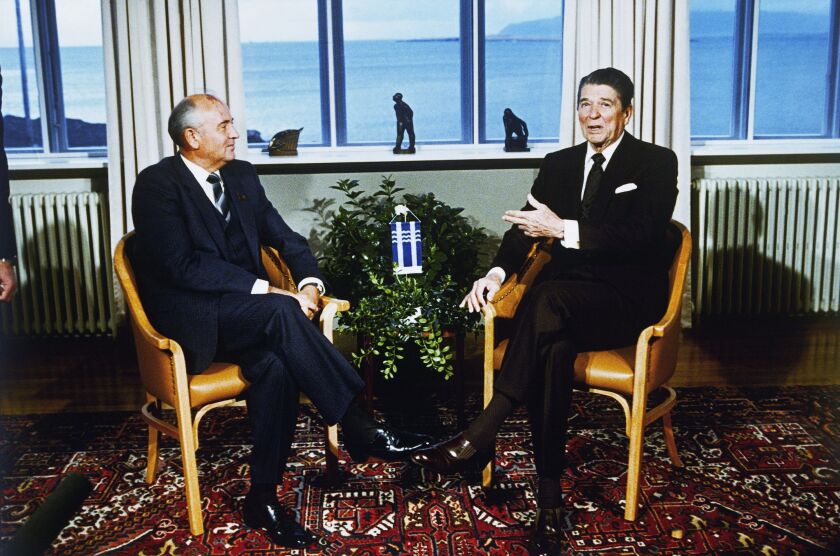 Soviet Leader Mikhail Gorbachev, left, and U.S. President Ronald Reagan talk during their meeting in Reykjavik, Iceland, Saturday, Oct. 11, 1986.